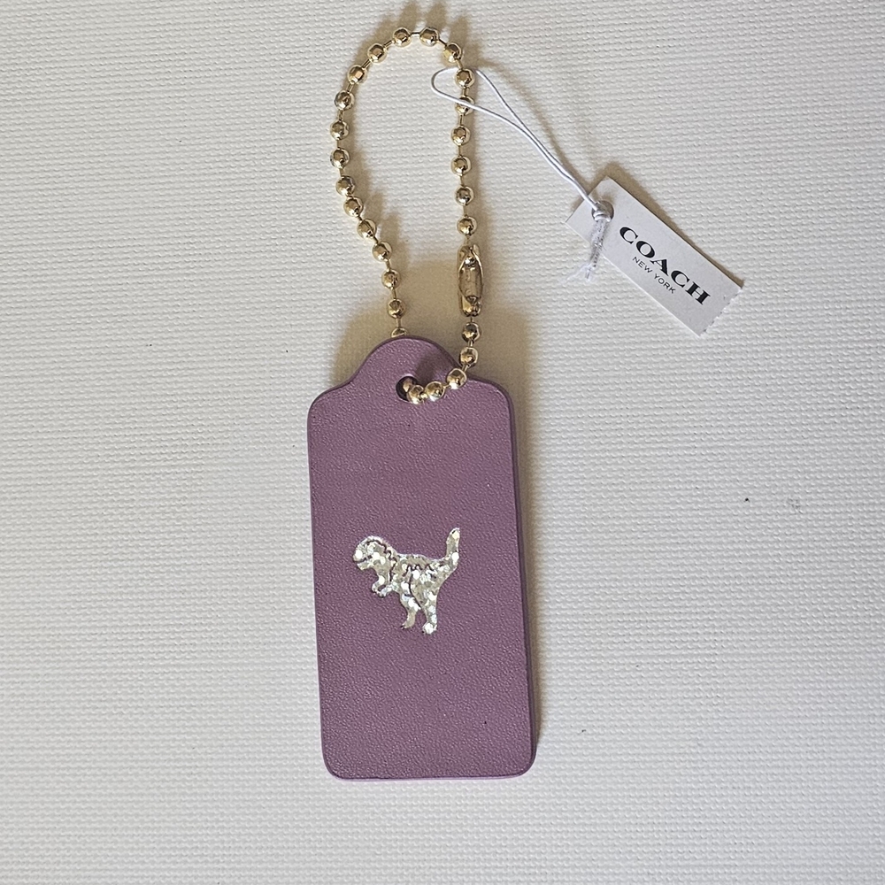 Coach Purple Luggage Tag with Dog Motif
